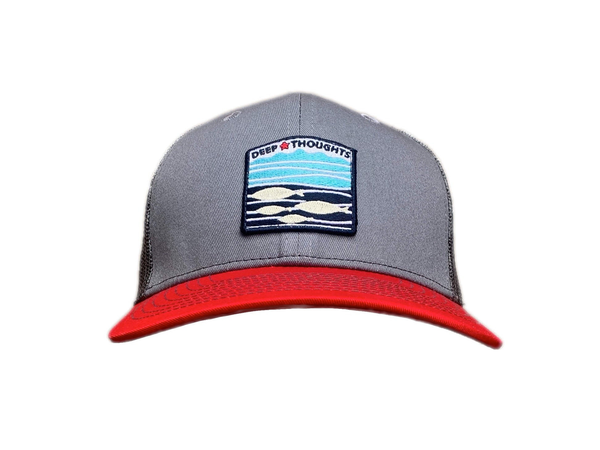 Front view of grey red and charcoal  trucker cap with red white and blue embroidered fish under waves patch