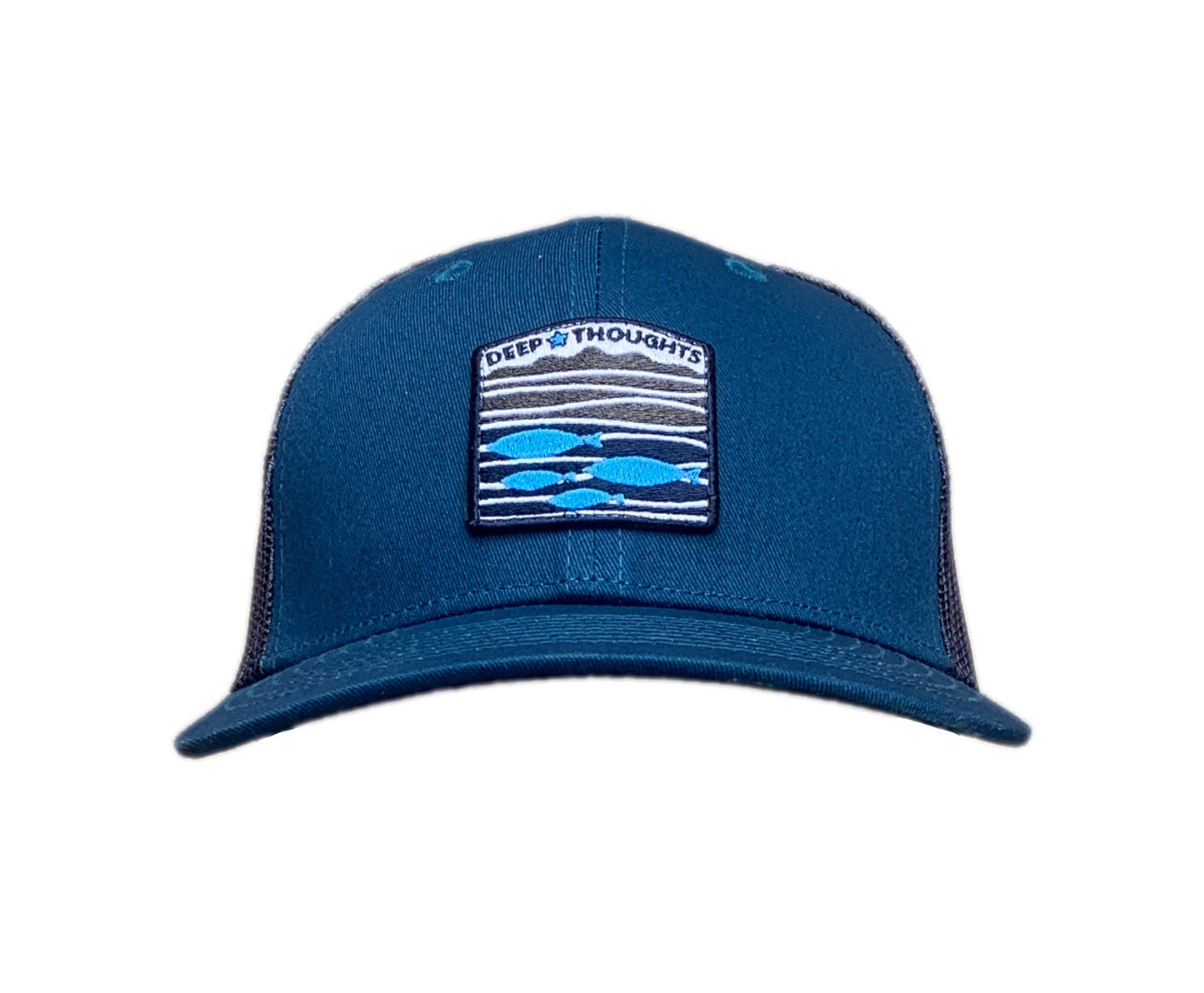 Front view of teal and navy blue trucker cap with blue and orange embroidered fish under waves patch