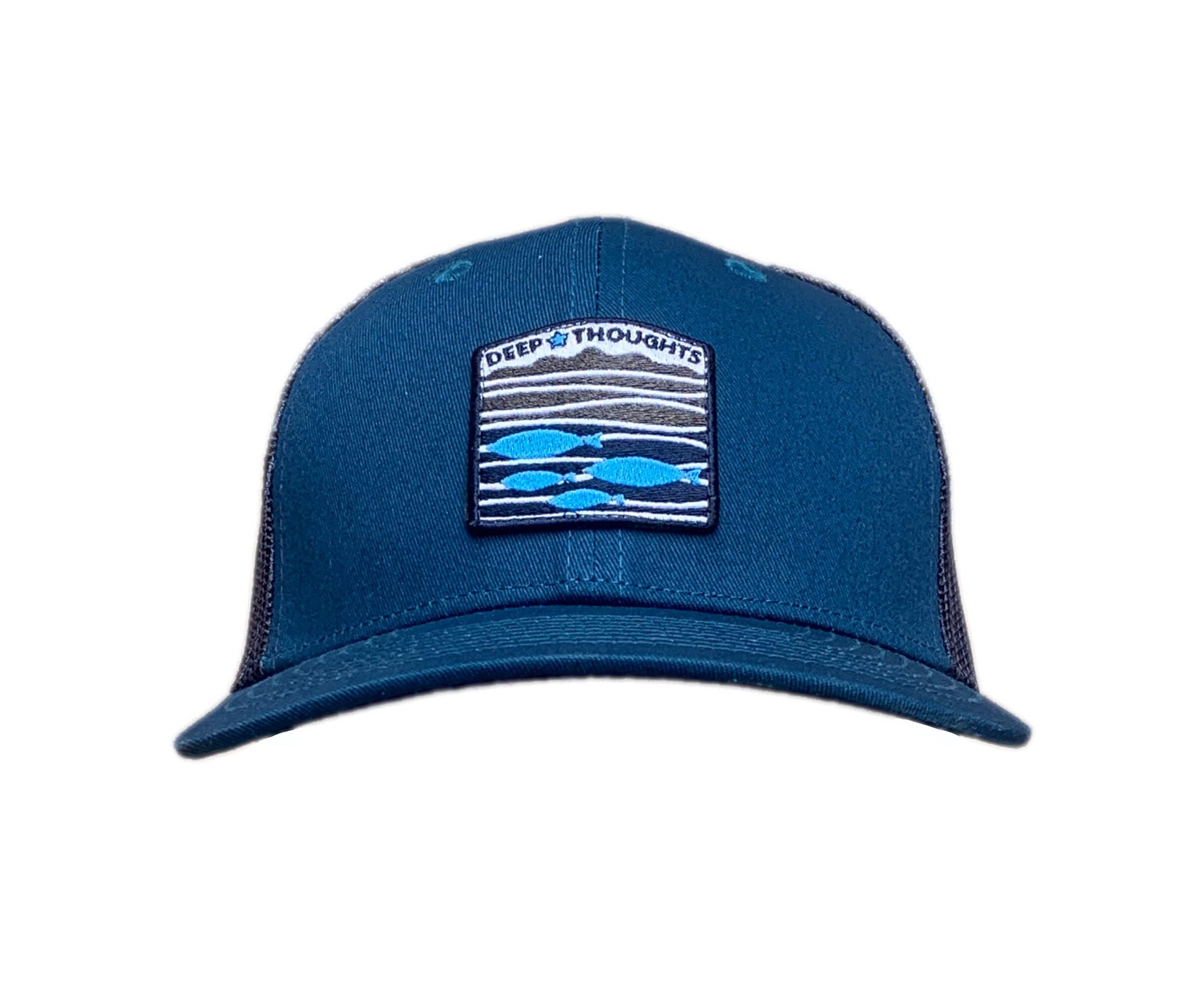 Front view of teal and navy blue trucker cap with blue and orange embroidered fish under waves patch